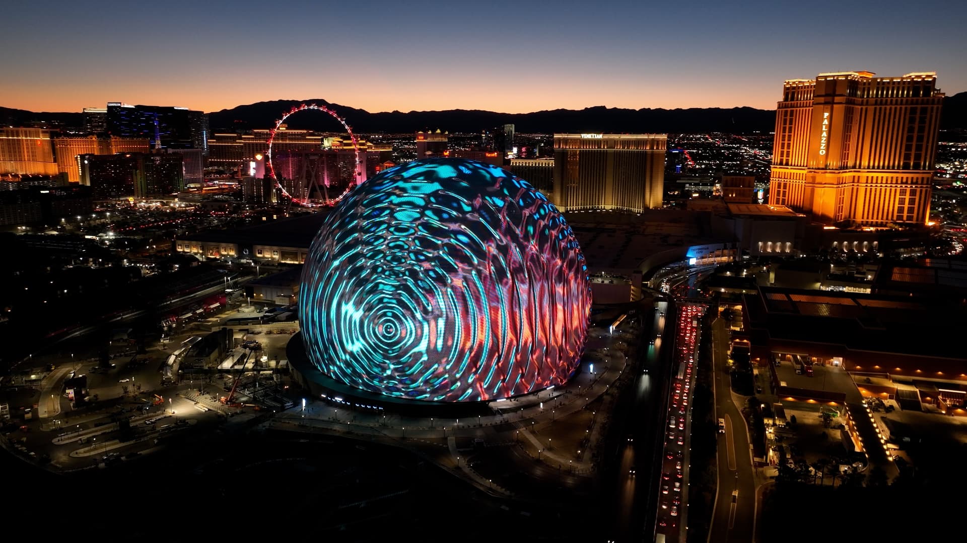 Las Vegas skyline at dusk with the Sphere, High Roller, and Palazzo