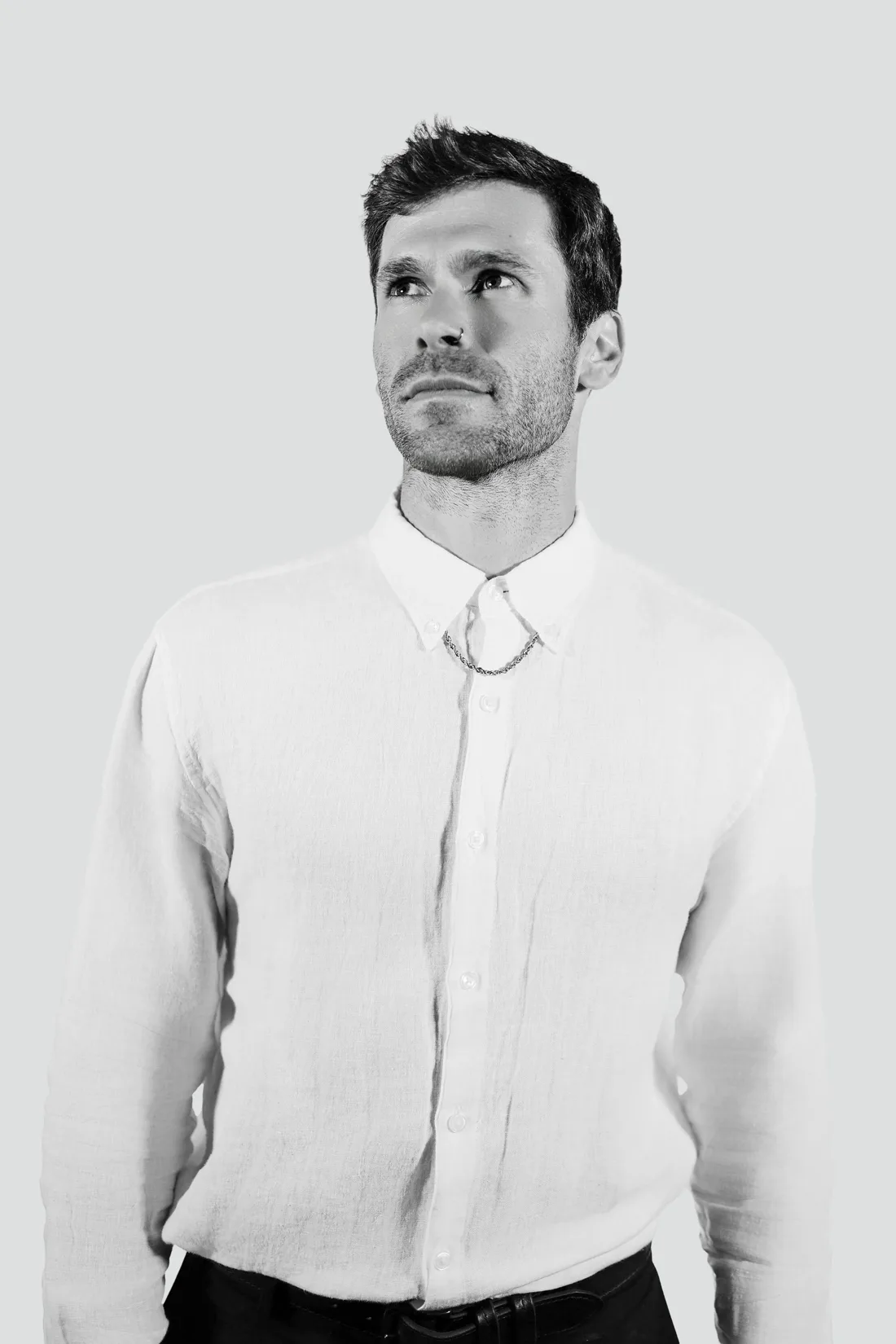 Black and white Glam Booth portrait of a guest in a white shirt
